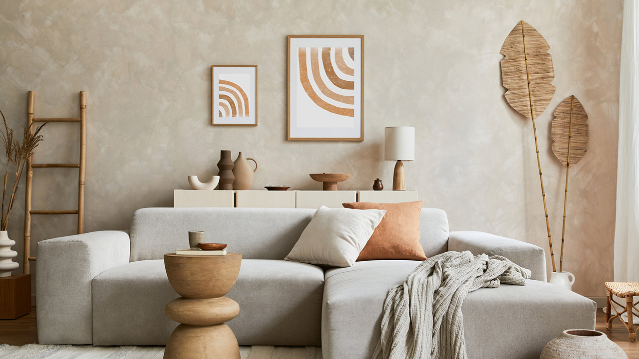 Elegant living room interior design with mock up poster frame, grey corner sofa, coffee table and personal accessories