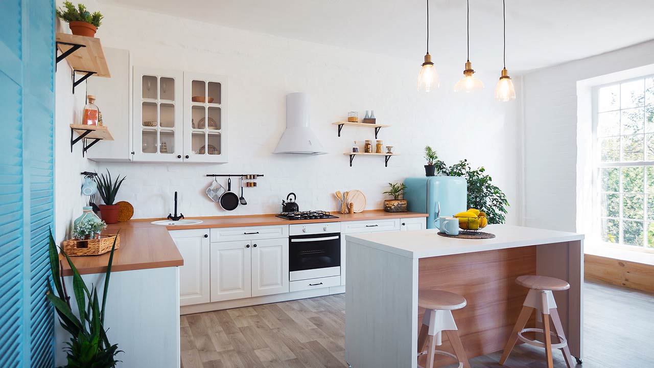 modern kitchen interior with island, sink, cabinets, and big window in new luxury home